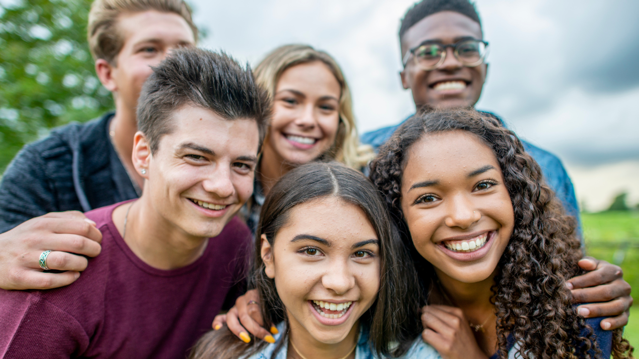 Diverse teens hanging out